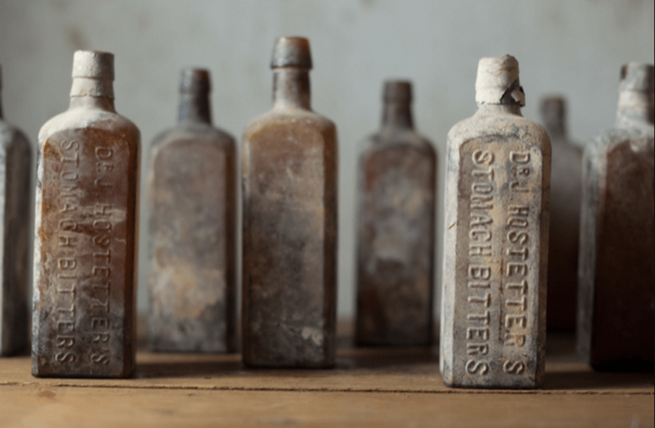 old dusty bitters bottles