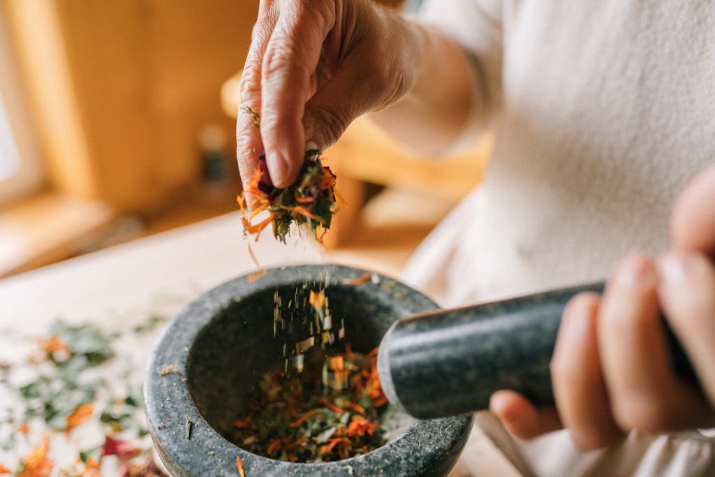 medicinal herb recipe-Pounding herbs with Mortar and Pestle